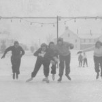 Batesies jockey for position during an ice skating race on Garcelon field; 1939.