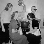 The 1939 Carnival Queen and her attendants mix up a delicious lobster stew.