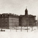 Then: (January) In this image taken more than a century ago, Bates' two oldest buildings face the still-young trees on the historic Quad. Parker (at left) and Hathorn halls were opened in 1857.  Photograph by Miles Greenwood, 1894, gelatin silver print, the Edmund S. Muskie Archives and Special Collections Library.