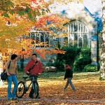 Now: (October) Stunning foliage and people in motion continue to define the historic Quad in autumn.   Photograph by David McLain.