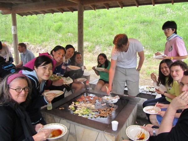 Professor Tieken and Mi Hui Wong enjoy dinner and society with students from Technos College and other US colleges in June 2013.