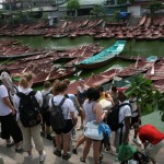 Boarding the small boat to the Perfume Mountain, Ha Tay.