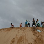 Visiting the Sand Dunes, Mu Ne. Prof. Trian climbed the sand dune after sledding down to the bottom.