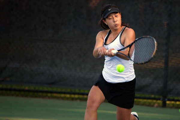 Ashley Brunk '13 teamed up with Elena Mandzhukova '15 to win at No. 1 doubles against Wesleyan on April 28, 2013. File photo by Michael Bradley/Bates College.