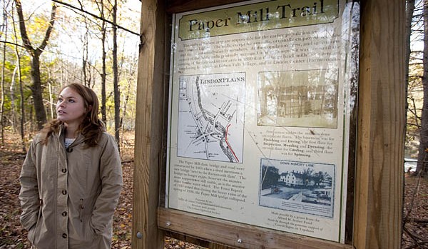 Georgia Doucette '12 during a visit to a finished portion of the municipal trail system in Lisbon, Maine.
