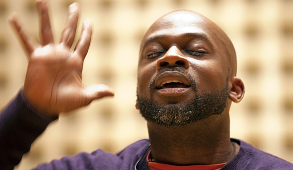 Shown performing at Bates in January, Marc Bamuthi Joseph brings his dance and spoken-word piece "red, black & GREEN: a blues" to Bates in April. Photograph by Phyllis Graber Jensen/Bates College.