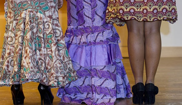Modeling Nigerian dresses for the Inside Africa Fashion Show are sophomores Folarera Fasawe, Michelle Pham and Nicole Kanu.