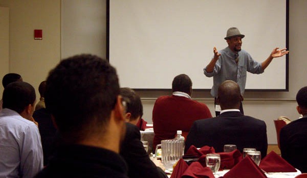 Ozzie Jones '92 offers advice at a Bates-hosted conference for black and Latino male students. Photograph by Simone Schriger '14.