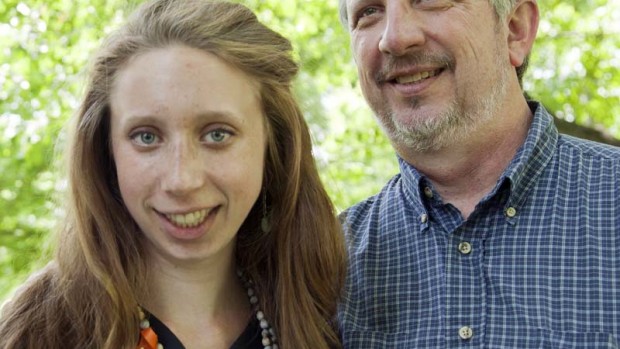 Robert Long '79 poses with his daughter Erica Long '12 on Commencement morning. Photograph by Phyllis Graber Jensen / Bates College.