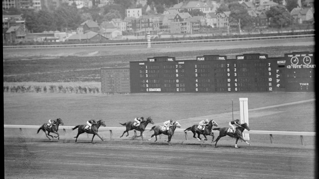 Bookies and other gamblers used to depend on skilled "line men," like Uncle Arthur, for timely sports results, including race results from Suffolk Downs in East Boston, shown here in the 1930s. Photograph courtesy of the Boston Public Library, Leslie Jones Collection.