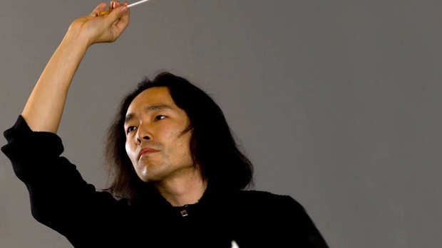 Hiroya Miura conducts the Bates College Orchestra. Photograph: Phyllis Graber Jensen/Bates College.