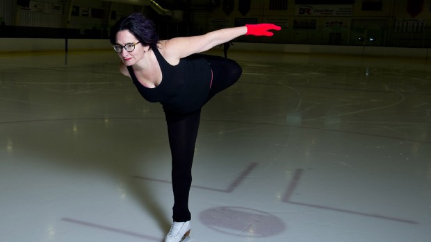 A participant as well as scholar of culture, Rand often injects personal experiences into her work. Here, skating in Falmouth, she bends back her leg for a catch-foot spiral, an "age-defying" move she describes in Red Nails, Black Skates. Photograph by Mike Bradley/Bates College.