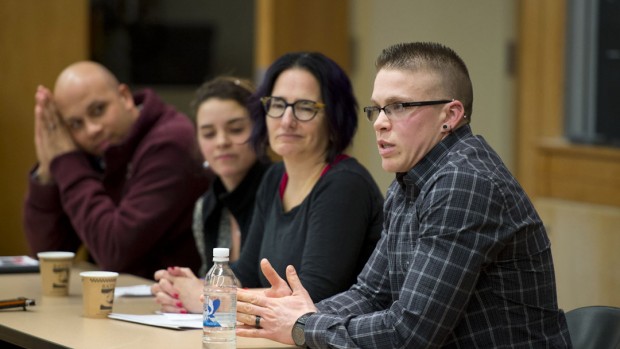Keelin Godsey '06 makes a point during the panel discussion "Economic Challenges, Social Justice and the Athletic Experience," part of the college's Martin Luther King Jr. Day program on Jan. 21, 2013. Panelists also included moderator Erica Rand, Whitehouse Professor of Art and Visual Culture and Women and Gender Studies; student athlete Jacqui Holmes '13; and head squash coach Pat Cosquer '97. Photograph by Mike Bradley/Bates College.
