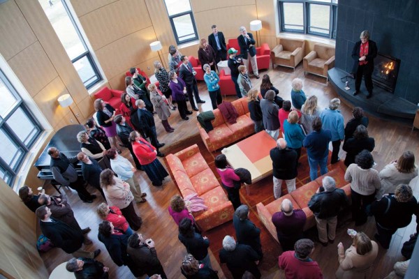 Bates staff and faculty gather in the Fireplace Lounge in New Commons to ask questions of and hear from their new leader. Photograph by Phyllis Graber Jensen/Bates College.