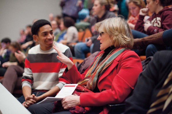 The president-elect makes tracks to get up to speed on Bates Sean McGhee ‘12 of Chicago, Ill., talks with Spencer in the Olin Arts Center Concert Hall, site of the annual debate between Morehouse and Bates on Martin Luther King Jr. Day. Photograph by Phyllis Graber Jensen/Bates College.