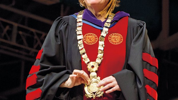 Clayton Spencer shows off the presidential collar following her installation as the college’s eighth president.
Photograph by Mike Bradley