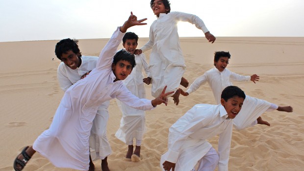 Saudi boys cavort in the desert. Photograph by Gintare Balseviciute '13