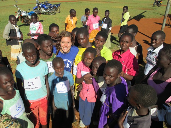 Devin Tatro '14 with some of the competitors in the first Kapchowra Kids Race, held Dec. 1, 2012 in Kapchowra, Uganda.