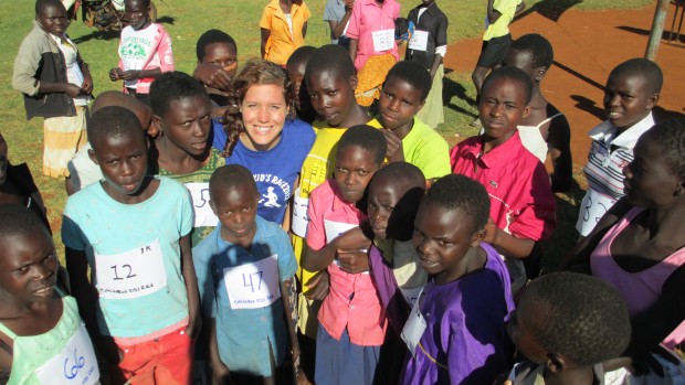 Devin Tatro '14 with some of the competitors in the first Kapchowra Kids Race, held Dec. 1, 2012 in Kapchowra, Uganda.