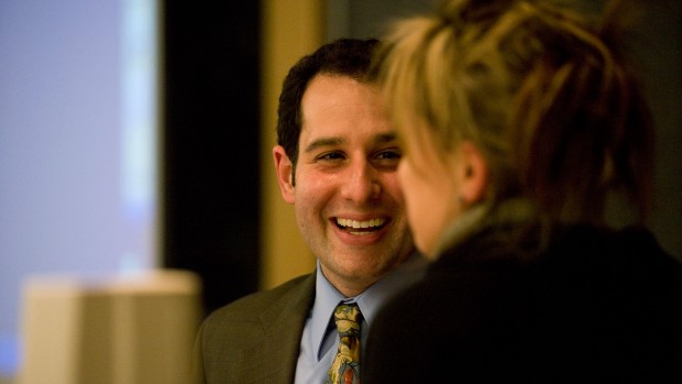 Jonathan Adler '00, seen here talking with Kati Vecsey of the theater department during his lecture at Bates in 2008.