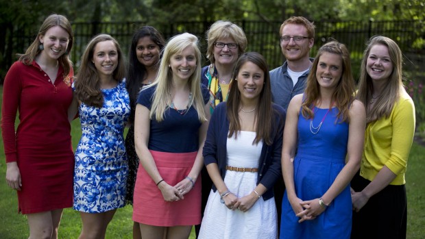 With the exception of Hakimah Abdul-Fattah and Cameron Sheldon, who were abroad, the 2013 Fulbright grant recipients attended a May 13 reception at the home of Bates President Clayton Spencer. From left: Catherine Tuttle, Libby Egan, Tara Prasad, Marisa Mohrer, Spencer, Valerie Jarvis, Hansen Johnson, Nora Flanagan, Taryn O'Connell. Photograph by Phyllis Graber Jensen/Bates College.