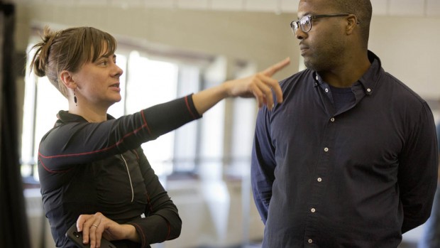 Choreographer and dancer Erin Gottwald '98 confers with rapper, writer, actor and director Postell Pringle '98. The classmates are on campus to lead longstanding Short Term unit "Tour Teach Perform," in which students create a dance piece and teach it to pupils in local schools. (Phyllis Graber Jensen/Bates College)