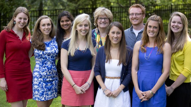With the exception of Hakimah Abdul-Fattah and Cameron Sheldon, who were abroad, the 2013 Fulbright grant recipients attended a May 13 reception at the home of Bates President Clayton Spencer. From left: Catherine Tuttle, Libby Egan, Tara Prasad, Marisa Mohrer, Spencer, Valerie Jarvis, Hansen Johnson, Nora Flanagan, Taryn O'Connell. Photograph by Phyllis Graber Jensen/Bates College.