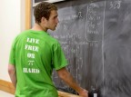 Creating knowledge: Daniel Paseltiner '16 works on mathematical group theory for the course nicknamed "Math Camp" during Short Term 2013. Photograph by Phyllis Graber Jensen/Bates College.