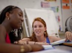 Brenna Callahan works with an unidentified pupil at Montello School. (Phyllis Graber Jensen/Bates College)