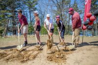Co-captains Naso, Conover, Taylor, and Wettstein join Steenstra for a turn at the shovels.
(Photograph by Rene Roy)