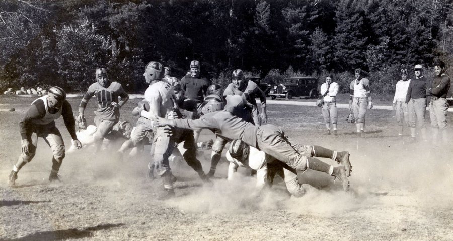 Bates football players do preseason drills at Camp Wonalancet in Eaton Center, N.H. The year is likely 1939. (Photograph by Richard Bowers Oliver)