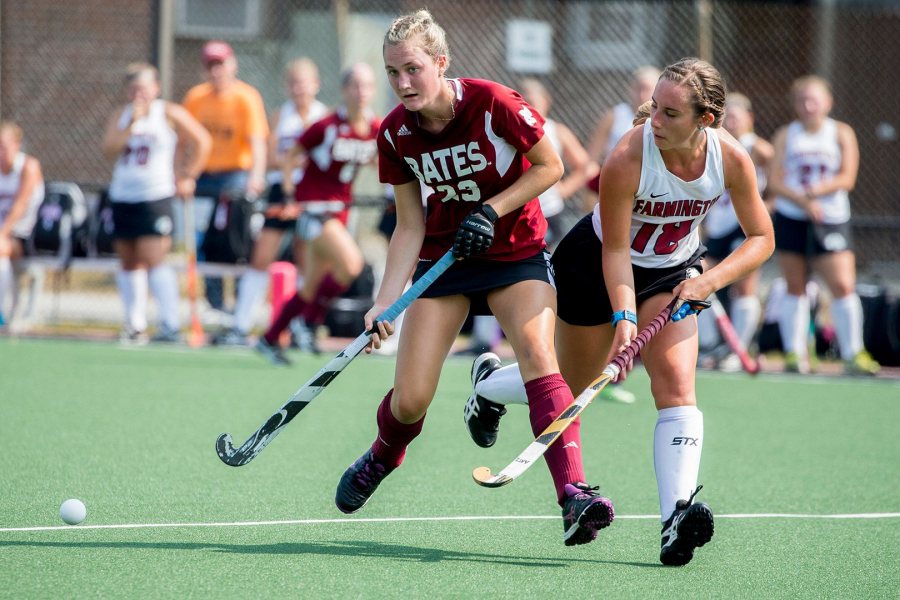 Field hockey takes on Middlebury on OCt. 21. Shown: Grace Fitzgerald '20 with an opponent from Maine–Farmington. (Phyllis Graber Jensen/Bates College)
