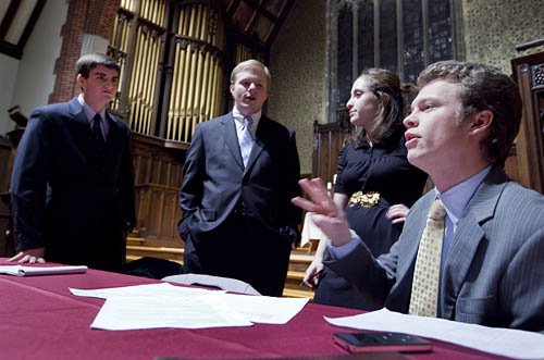 Yale debaters Josh Kalla and Grant May confer with Brooks Quimby seniors Ariela Silberstein and Matt Marienthal. Yale debaters Josh Kalla and Grant May confer with Brooks Quimby seniors Ariela Silberstein and Matt Marienthal.