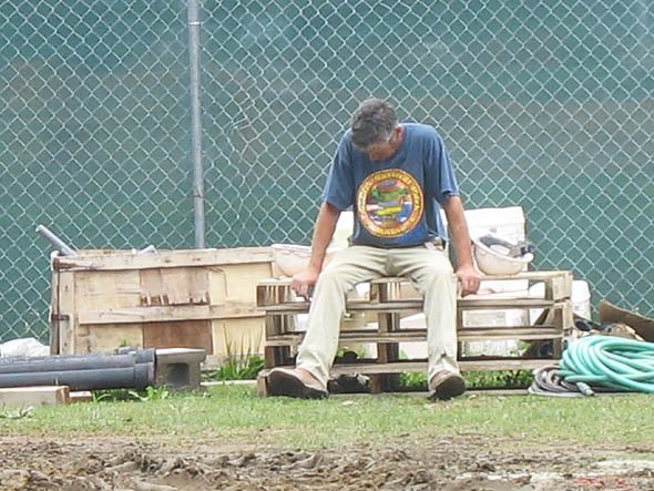 Construction worker rests Construction worker rests