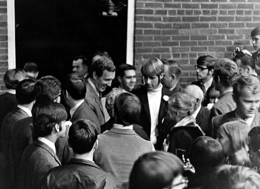Bates students greet U.S. Sen. Edmund Muskie '36 after his address on Oct. 15, 1969, in Alumni Gym on the occasion of the Vietnam Moratorium.