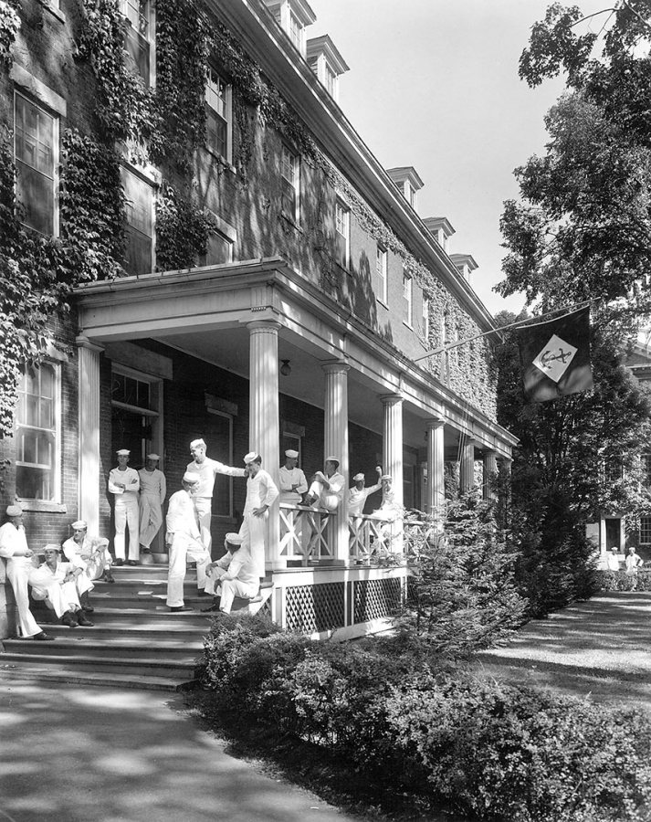 Outside Parker Hall, V-12 sailors hang out. (Muskie Archives and Special Collections Library)