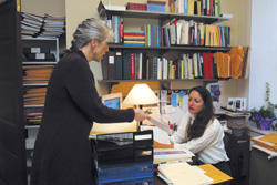 Shown here with executive secretary Linda Sarro, Hansen gets high marks from her staff. "I never cringe at the thought of a decision she's made," says Sue Waddington, assistant to the provost. "We're pretty much all on board with her. She will consult the lowest-ranking member of the staff as well as the president."