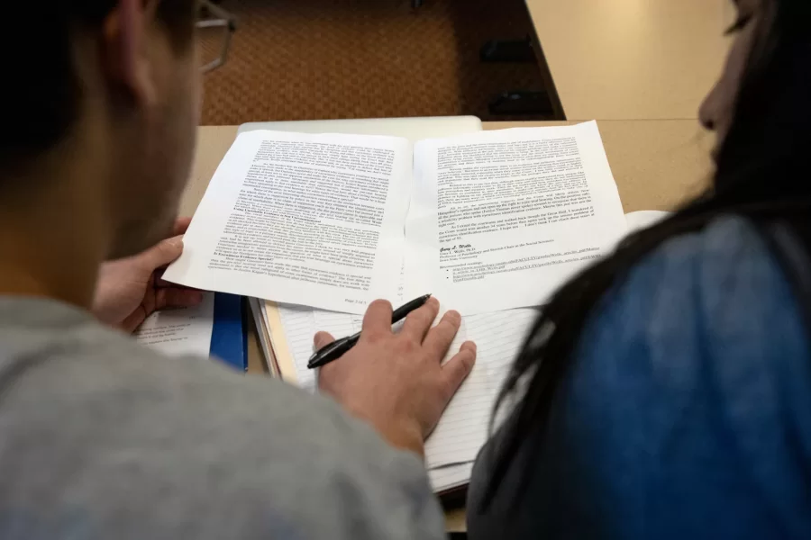 A day in the life of Pettengill Hall, featuring staff, faculty and students engaged in learning, studying, and working, with both internal and external images.

Amy Douglass teaches “Psychology and Law,” G12