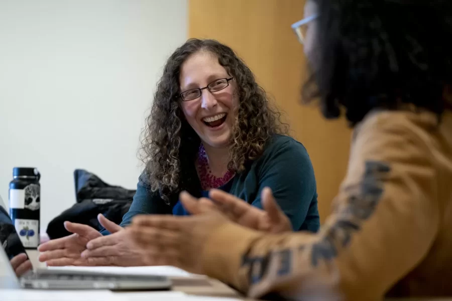 Associate Professor of History Caroline Shaw works with Ursula Rall ’20 of Kent, Ohio, during Shaw’s course on sex, gender, and modern cities. Shaw received a grant from the National Endowment for the Humanities to research a book on the history and importance of reputation in Britain. (Phyllis Graber Jensen/Bates College)
