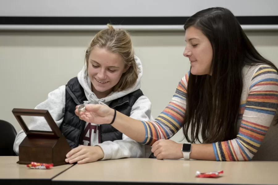 “I feel the history.”⁣
⁣
— Justin Phillips ’23 of Old Saybrook, Conn., and Max McKersie ’23 of Arlington, Mass., tried on not one, but four, Major League Baseball World Series rings that belong to New York Yankees minor league hitting coach Ken Joyce. Joyce appeared on an end-of-semester panel in psychology professor Sun Langdon’s first-year seminar, “The Sporting Life.”⁣
⁣
Joyce passed the rings around the Pettengill seminar table after he and five other guests spoke about the trajectory of their careers and the events that inspired them. Panelists included: Joyce; Joan Benoit Samuelson, world-record and Olympic gold medalist marathoner; Pat Gallant-Charette, world-record-setting marathon swimmer; Glenn Jordan, sports writer for the Portland Press Herald and Maine Sunday Telegram; Andy Shepard, founder and former CEO of Outdoor Sports Initiative, and Jason Fein, Bates College director of athletics.⁣
⁣
This purposeful work-infused course explores the major importance of sports in many people’s lives, as participants and spectators. Students consider sports from myriad perspectives, from the social and natural sciences to the humanities. The interdisciplinary first-year-seminar uses a variety of sources including academic articles, personal memoir, fiction, film, and observation.⁣
⁣
⁣After class, Phillips and McKersie, varsity men’s soccer teammates, spoke with Coach Joyce about careers in sports management, before joining the panelists and students for lunch at Commons. Swipe left to see a few more scenes from class. ⁣
⁣