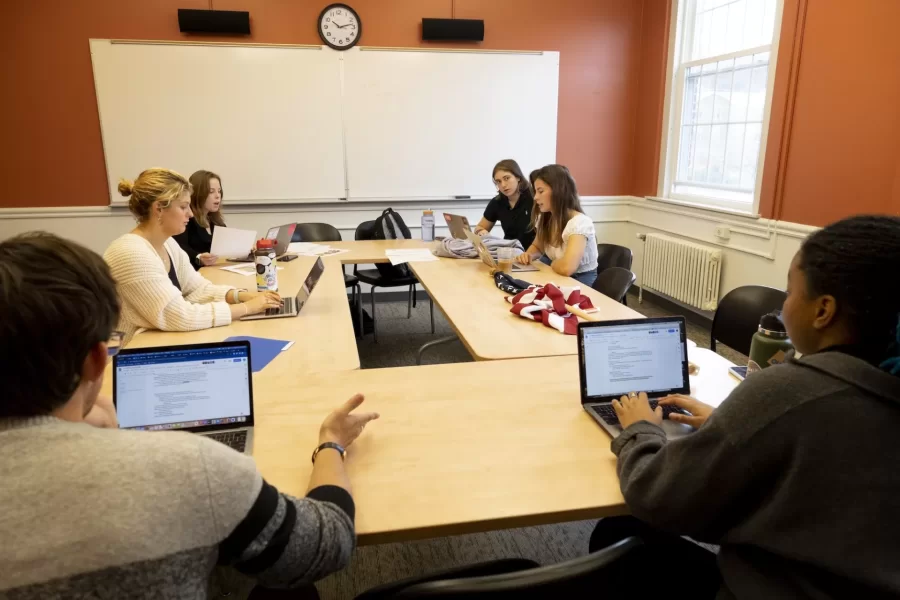 Yesterday, two presidential campaigns designed by Bates students faced a scandal, and each team had 90 short minutes in which to respond.

A blessedly mock campaign, it’s a component of “Presidential Campaign Rhetoric,” which Professor of Rhetoric, Film, and Screen Studies Stephanie Kelley-Romano has taught every couple of years since the early 2000s.

This year, Kelley-Romano asked each campaign to prepare two responses. “One where they have to address (minimize and justify) what went on and a second where they can totally deny it. At the end of the class period I will have another story for each campaign that shows the accusations were false and they are absolutely vindicated (these stories can then run in our fake newspaper without the danger of damaging the candidate images or campaigns). During the class there will also be other information that "breaks" that they will have to respond to

The course is a senior seminar, and part of its coursework is traditional. Students do readings and have discussions, getting a handle on the many rhetorical devices that presidential campaigns deploy in speeches, ads, debates, and social media, as well how the news media interprets all this political discourse.

Simultaneously, the students get to practice and hone their rhetorical skills during the mock campaign. Everyone in the class has a role, from doing social media and speechwriting to playing family members and news reporters.

For the first time, this year’s two campaigns will not be affiliated with either of the two major U.S. parties (nor with any other party, whether Greens, Libertarians, or even Whigs).

Getting rid of the labels, Kelley-Romano hopes, will make “voters,” the nearly 600 students who are in various courses that intersect with the campaign, “think twice about what they’re hearing.” While an overall goal of the mock campaign is to increase the quality of public discourse, it’s up to each campaign to “balance responsible discour
