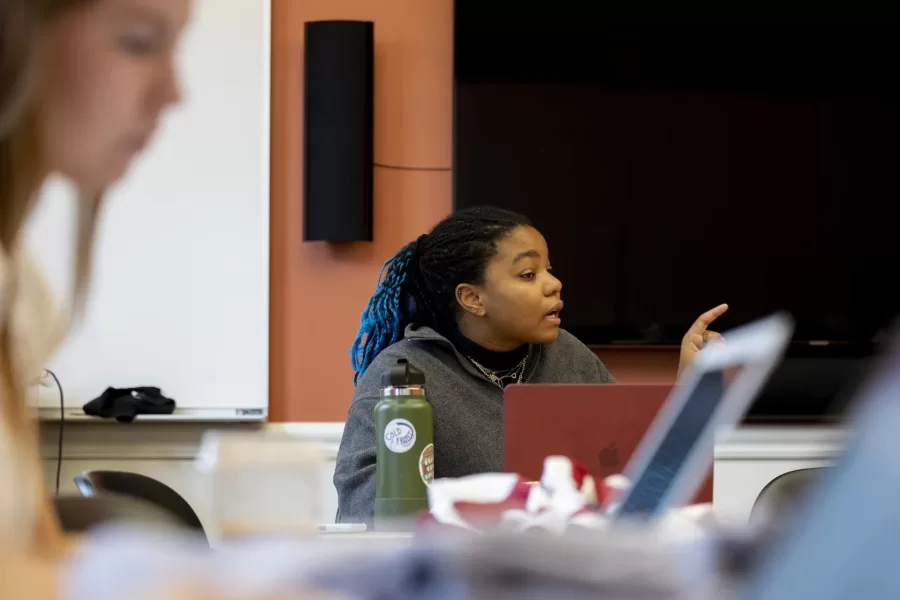 Yesterday, two presidential campaigns designed by Bates students faced a scandal, and each team had 90 short minutes in which to respond.

A blessedly mock campaign, it’s a component of “Presidential Campaign Rhetoric,” which Professor of Rhetoric, Film, and Screen Studies Stephanie Kelley-Romano has taught every couple of years since the early 2000s.

This year, Kelley-Romano asked each campaign to prepare two responses. “One where they have to address (minimize and justify) what went on and a second where they can totally deny it. At the end of the class period I will have another story for each campaign that shows the accusations were false and they are absolutely vindicated (these stories can then run in our fake newspaper without the danger of damaging the candidate images or campaigns). During the class there will also be other information that "breaks" that they will have to respond to

The course is a senior seminar, and part of its coursework is traditional. Students do readings and have discussions, getting a handle on the many rhetorical devices that presidential campaigns deploy in speeches, ads, debates, and social media, as well how the news media interprets all this political discourse.

Simultaneously, the students get to practice and hone their rhetorical skills during the mock campaign. Everyone in the class has a role, from doing social media and speechwriting to playing family members and news reporters.

For the first time, this year’s two campaigns will not be affiliated with either of the two major U.S. parties (nor with any other party, whether Greens, Libertarians, or even Whigs).

Getting rid of the labels, Kelley-Romano hopes, will make “voters,” the nearly 600 students who are in various courses that intersect with the campaign, “think twice about what they’re hearing.” While an overall goal of the mock campaign is to increase the quality of public discourse, it’s up to each campaign to “balance responsible discour