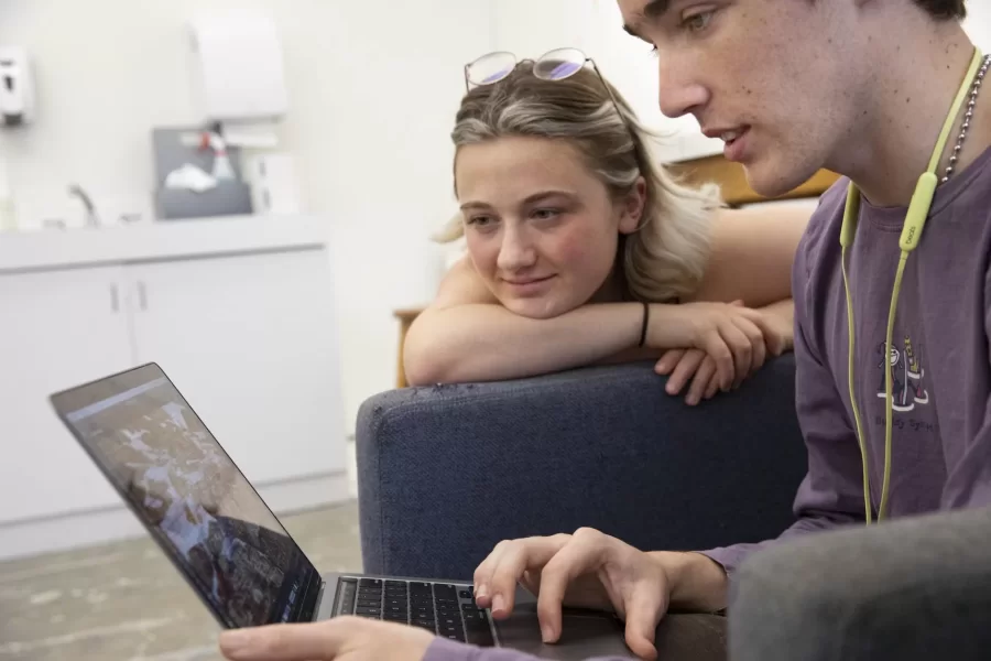 Art and visual culture majors with a studio concentration work in their first-floor Olin Arts Concert Hall studios in preparation for the Annual Senior Exhibition that will open in April at the Bates College Museum of Art.

Emily Graumann ’22 (in gray sweater) of Salem, a double major in AVC and English, is producing a thesis in hand-drawn animation.

Ollie Penner  ’22 (purple shirt) of Pasadena, Calif,, is a double major in AVC and American Studies, whose thesis uses photography and Photoshop.

Kathy Boehm ’22 (black sweater) of Denver, Colo.,  is a double major in AVC and American studies, who’s designing town with  drawings and mixed media.

Mary Richardson ’22 (black tank top) of Blue Hill, Maine, is a double major in AVC and psychology and exploring themes of growing up and bodily image. She’s using mixed media and colored pen.