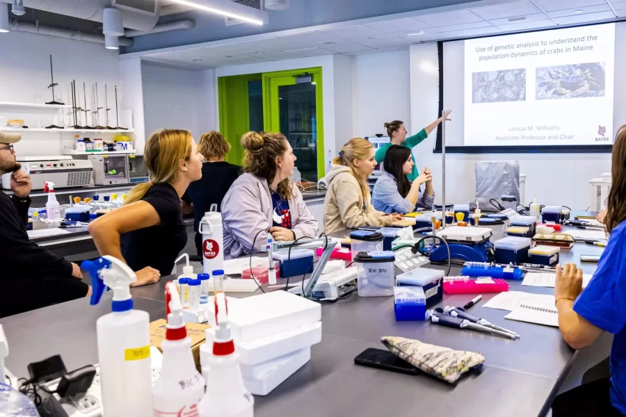 Associate Professor of Biology Larissa Williams teaches students in Bio s39f a lesson on “uses of Genetic analysis to understand the population of dynamics of crabs in Maine.” They met in Bonney 370 laboratory and received instruction on how to use a pipette, including closing their eyes in preparing to click the instrument.

The course’s instructor is Jesse Minor ’00, a lecturer in biology.