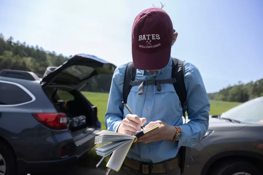 Professor of Earth and Climate Sciences Beverly Johnson takes her summer research students who are studying blue carbon cycling in salt marshes to Bates-MorseMountain in Phippsburg.

An EPA regional assessment of blue carbon stocks has recently been released.  Maine data are almost entirely from Johnson’s lab so Bates is heavily featured (mostly her thesis students).

Anna Sarazin (EACS 2024; funded by Maine Sea Grant) ---- short with red/blonde hair
Kate Dickson (EACS 2024; funded by Maine Sea Grant) ---- tall, carried the backpack, red hair
Hayden Eckblom (EACS 2025; funded by Maine Climate Science Information Exchange) --- the only male
Fiona Wilson (Biology, 2025; funded by Maine Community Foundation) ----- the one wearing all the netting, blondish/red hair in pigtails
Evelyn Marchand (EACS 2026; funded by Maine Community Foundation) --- dark hair