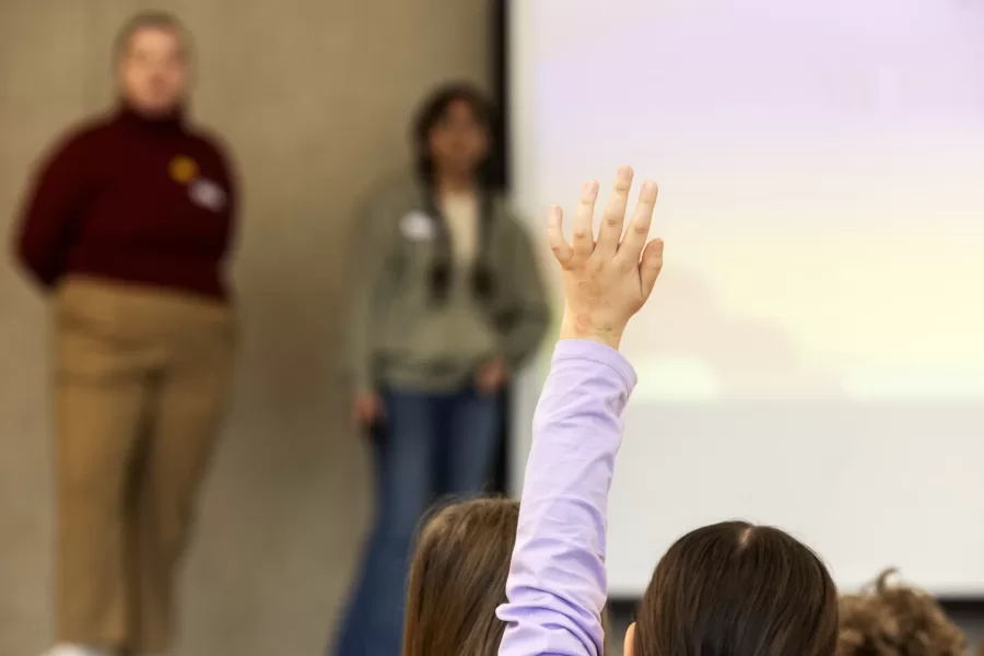 Bates College students from FYS 491: Reading Japan in Multicultural Picture Books taught by Keiko Konoeda, lecturer in Japanese, visit 5th graders from Geiger Elementary School on December 12, 2023. Bates students helped the 5th graders make their own Onigiri and paper cranes. (Theophil Syslo | Bates College)