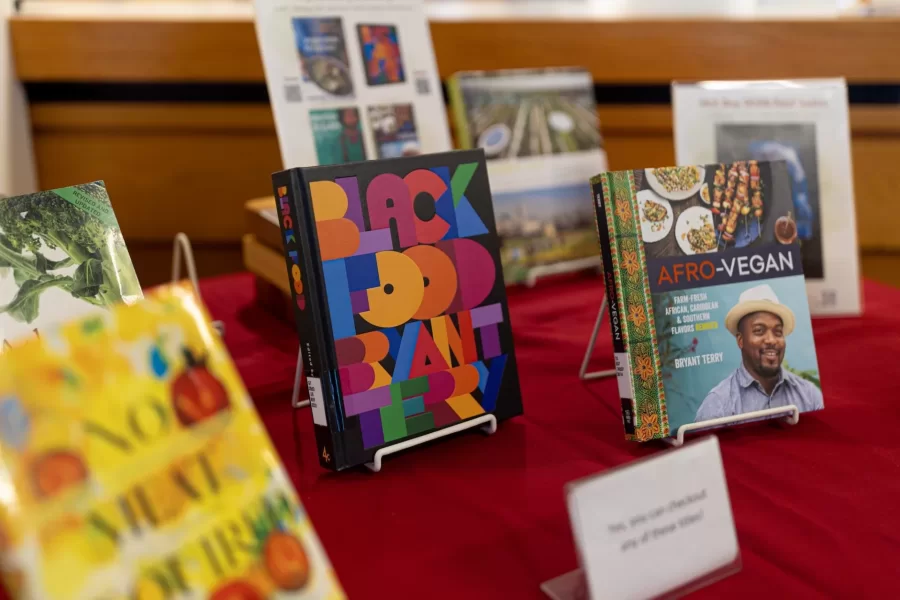 Welcome back!

The winter semester at Bates began today, Wednesday, Jan. 10, 2024. After consecutive snow and rain storms — one of each — the warmth of the sun reappeared midday, along with the pleasure of reconnection.

Swipe left for photographs of folks who were willing to be described as “happy to see one another after winter break.”

Their smiles tell the story.

Tim Ruppert ’27 (in black jacket and tan pants) of Edina, Minn., stops for a chat on Alumni Walk with Jack McAvoy ’24, a politics and philosophy major from Scarsdale, N.Y., and as they return to campus after winter break. 

McAvoy was Ruppert’s AESOP Habitat for Humanity II trip leader in Rockland, Maine. They teamed up with other students to build a cul de sac. 

Books on display for MLK Day 2024, featuring cookbooks by keynote speaker Bryant Terry.