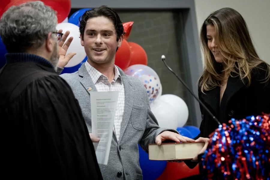 This year's Presidential Campaign Rhetoric class had a ball—an inaugural ball, that is.

On Monday night on the second floor of Commons, "President-elect" Claire Bennett (played by Leah Belber '26 of Washington, D.C.) officially became "President" Bennett after taking the oath of office administered by Professor of Politics Stephen Engel. Here, she is seen with her loving "husband," John Bennett (played by George Wan '25 of Hong Kong), who held a constitutional law textbook during the mock ceremony.

Among other scenes, swipe left to see Vice President Lawrence "Frank" Green (played by Freddie Curtis '25 of Harvard, Mass.) take his oath of office alongside his "wife," Elizabeth Green (played by Claire Bohmer '25 of Steamboat Springs, Colo.). President Bennett also celebrates with her campaign manager, Katherine Moe ’25 of Washington, D.C.

Win or lose, members of the Presidential Campaign Rhetoric class and their friends toasted to a job well done with tasty treats and sparkling cider. Taught by Stephanie Kelley-Romano (@profskr), professor of rhetoric, film, and screen studies, the popular rhetoric course is affectionately known by its acronym "PCR." It offers an intensive and immersive interdisciplinary experience, where mock campaigns run ads, deliver speeches, navigate scandals, and engage with "the media"—also staffed by PCR classmates.

Congratulations to both campaigns and the PCR media coverage from "The Political Times" for another successful and hard fought campaign season.