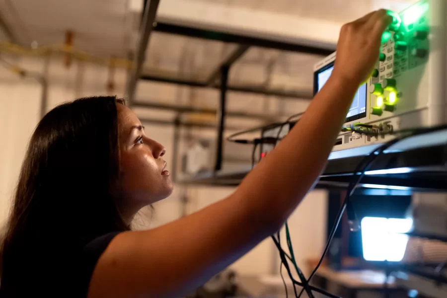 Assistant Professor of Physics Ryan Cole works with students in his Carnegie Science 156 lab on June 20, 2025. There is a secondary lab pictured in some of the photos that he and Paloma visited wearing goggles, where they used a laser to measure light frequencies. 

“Every once in a while, science makes sense,” he said at one point to the students.



“Paloma is building an instrument to study very precisely sunlight and specifically the spectrum of sunlight for applications ultimately in exoplanets (planets orbiting other stars)  detection and characterization.

And then this table, which is Carson, Quinn, and Audrey (and Andrew Liu who is not here today) They are measuring how atmospheric gases like methane — specifically green house gases — interact with light to ultimately help us measure those things better in the atmosphere.

Students photographed:

Audrey Schane ’25, physics major, who is working as a research assistant with Cole this summer,
Shown at the computer (striped t-shirt), where she is looking at a gas sample where she’s building something to control gas temperatures, with a vaccuum on the bottom. 

Paloma Rodriguez ’26, a physics major (black t-shirt)

Carson Moellering ’26, physics major, looking at how methane absorbs light in different conditions (light reflecting back and forth in mirrors (white t-shirt)

Qwynn Kobertz ’26, double major in physics and studio art, using a DSR laser exploring how to use this laser in a methane detecting app. (sunglasses on head) Here are two quick links that may help with some context for what we're doing in the lab.

My research website: https://sites.google.com/bates.edu/colelab/research-areas?authuser=0

NIST Article on optical frequency combs: https://www.nist.gov/topics/physics/optical-frequency-combs