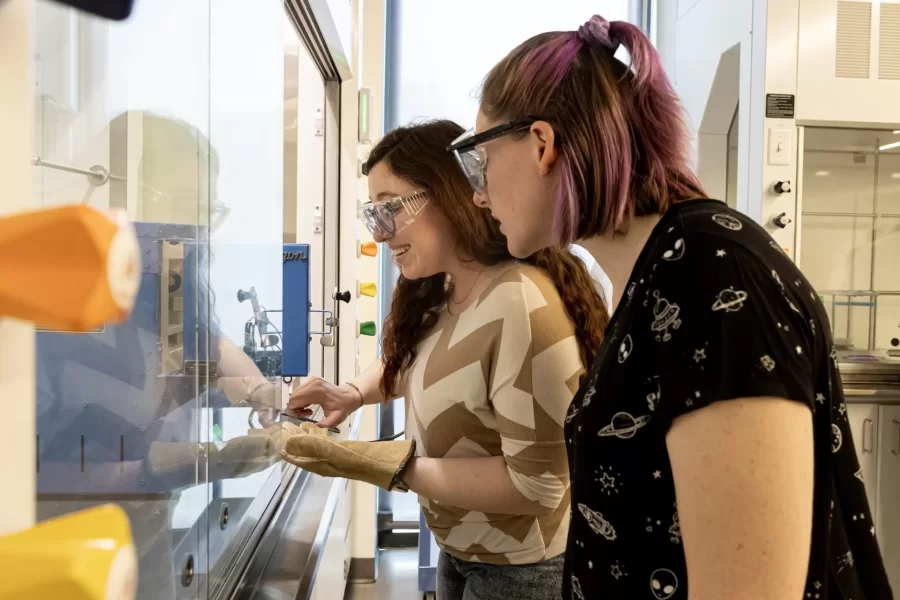 They are jumping for joy.
Women’s varsity rowing teammates Oli Seline ’24 (left) of Delaware, Ohio, and Olivia Dekker ’24 of Bethesda, Md., high five it at the conclusion of their last-ever Bates lab in Bonney 360.
The teammates are students in Assistant Professor of Biochemistry Geneva Laurita’s Short Term course, “Chemistry and the Arts.”
Seline is a biochemistry major with a GEC in “Visible Ideas,” while Dekker is a biochemistry major with a minor in art and visual culture.
The course explores the connection between chemistry and various topics in the arts and arts-related fields. The students learn about the chemistry behind these topics, exploring the literature behind various artistic practices, and applying hands-on techniques in the laboratory involved in various art processes
This year, Laurita asked students to focus on the origins of color, different crafts, print making, jewelry making, dyeing, and art conservation.
Laurita is the recipient of a major National Science Foundation grant of $581,984. The NSF CAREER award, considered to be one of the foundation’s most prestigious awards for faculty members who are just beginning their teaching and research careers, is based on both her scientific research in solid state materials and how she brings undergraduates into that vital area of scientific exploration.
3:18
What the particular lab was about...the lab handout.

Kate Baumler, intern for Geneva’s NSF grant, wearing, black shirt

Benji Richards, ’27, wearing tan shirt
Finian Gunny ’27, gray pullover and blond hair
Charlotte Maffie ’25 with pink tie dyed and hair in bun
Sister Alice Maffie ’27 in t-shirt and pony tail
Nina Greeley ’24 with hair in bun and pink t-shirt
Riley Lund ’26 in gray sweatshirt
Jahan Baker-Wainwright ’25 in green golf 
Rohini Kandasamy ’27 in dark tan Life is cool t-shirt and low bun

Chemistry and the Arts S28, the origin of different crafts, print making, jewelry making, dyeing and art soncserv